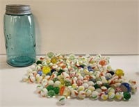 Assorted Marbles in Blue Mason Jar