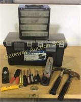 Toolbox with tools . Hammers , screwdrivers ,