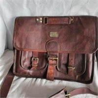 Leather travel bag with strap