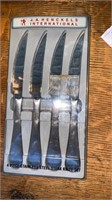 J. A. Henckels 4 piece steak knives