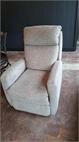 Made in USA recliner.  Approximately 32 inches