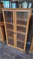 Wooden display case with shelves.  Approximately