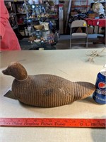 Antique duck decoy with glass eyes