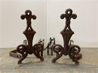 Pair cast iron andirons and log rack parts
