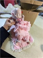 VTG porcelain wind up doll with blanket