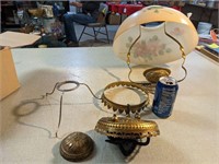 Various kerosene lamp parts.