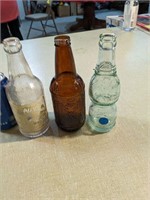 Lot of 3 vintage bottles.