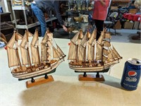 Set of 2 wooden ships with canvas sails.