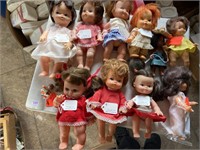 black/brown hair and pumpkin hard plastic dolls