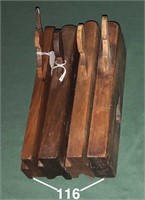 Four wooden molding planes