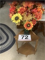 Corner table - green glass vase w/ flowers