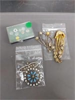 Collection of vintage jewelry and buttons