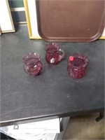 3 four inch cranberry vases