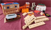 Assorted train set pieces and toys