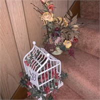 artificial flowers and birdcage decorations