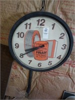 Fram filter clock battery operated 13.5in. Round