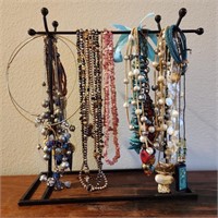Lot of Costume Jewelry on Stand
