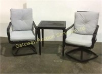 Two metal swivel patio chairs with side table.