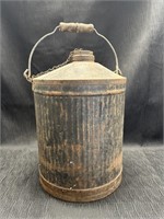 Vintage kerosene can, wooden handle
