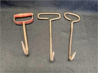 Three vintage hay hooks