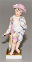 MEISSEN FIGURINE OF YOUNG BOY WITH FRUIT. 4.5"H.