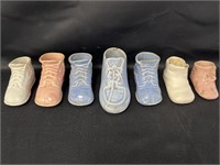(7) Ceramic baby shoes, 1 3/4 - 2 3/4in tall