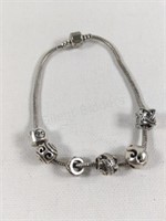 EVOLVE Sterling Bracelet w Silver Charms
