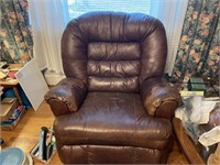 Leather recliner chair shows wear