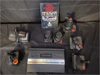 Original Atari system, manual and controllers