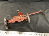 Vintage tin pull mower