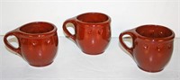 (4)  1986 Ned Foltz Redware Handled Mugs w/