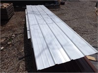 roughly 40 sheets of white roofing metal