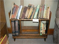 Wooden bookshelf (28" w x 26" h) filled with