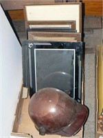 Flat with picture frames, old fiberglass hardhat