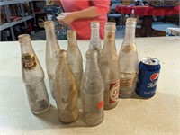 Lot of 8 vintage soda bottles