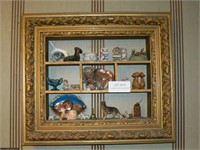 Antique shadowbox with small figures and