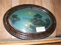 Oval bubble glass framed painting