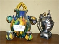 Pottery water jug with cups, knight's helmet