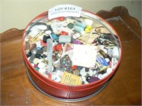 Large tin of buttons