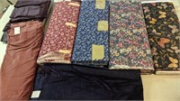 LOT OF ASSORTED BOLTS OF FABRIC