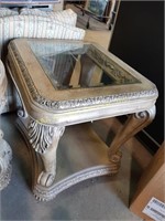 Rectangular ornate distressed end table with