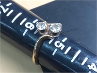 Round diamond ring containing two round brilliant