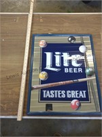 Miller Lite "tastes great" mirrored beer sign