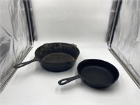 cast iron pans marked 4 and 5