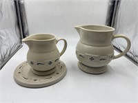 Longaberger pottery 2 pitchers and trivet