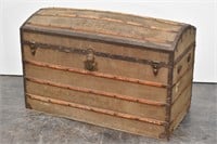 Antique Canvas-Covered Camel Back Trunk