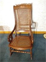 Cane bottom and back rocking chair with damage