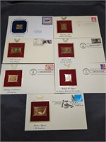 Seven 22k gold foil stamps first day covers