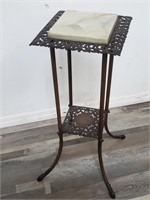 Two-tier metal plant stand with marble top