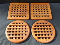Group of 4 routed wood trivets
